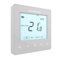 Heatmiser NeoStat v3 black smart thermostat with digital display showing room temperature and touch controls for home heating management